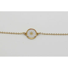 bracelet acier doré avec disque étoilé ikita.