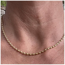 collier ras de cou boules doré