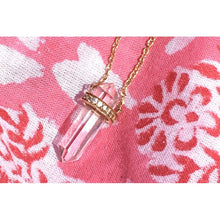 Collier doré avec cristal de roche